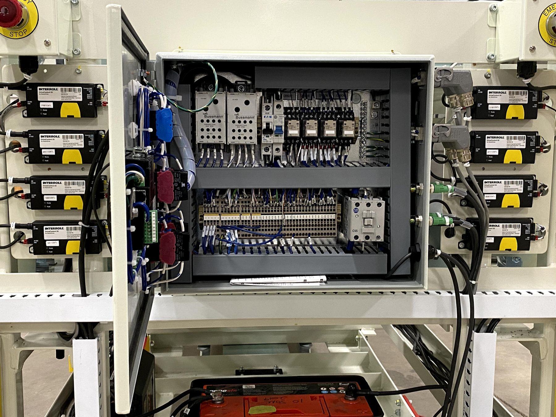 Interior of a PH-built junction panel: labelled terminal rows, relays and tidy wireways